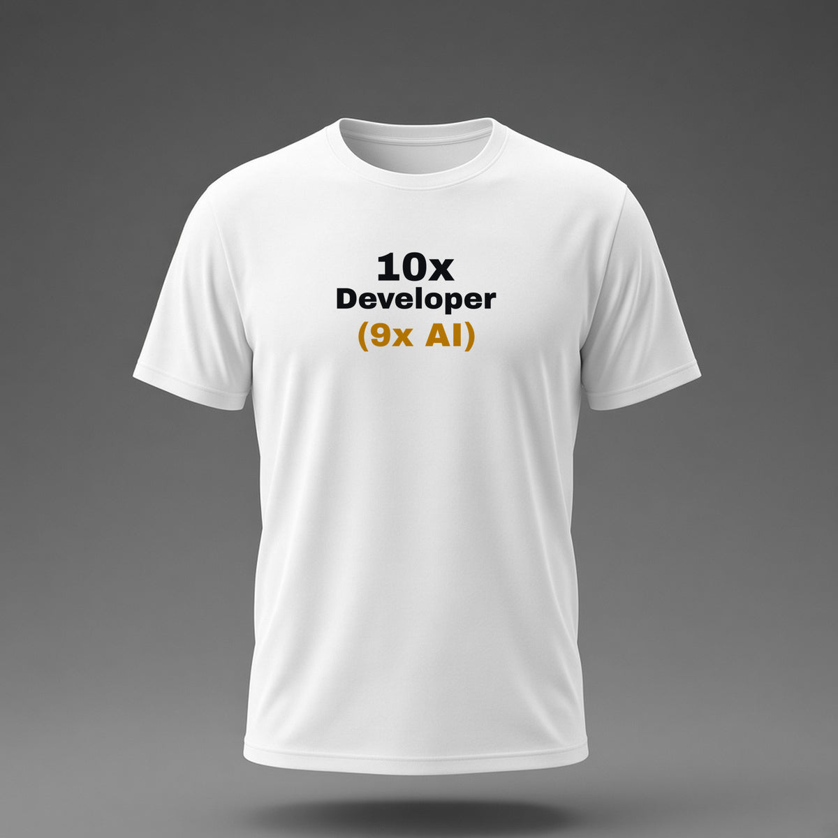Front view: White t-shirt floating on a grey background with '10x Developer (9x AI)' with the footnote in amber printed across the chest in black and dark amber.