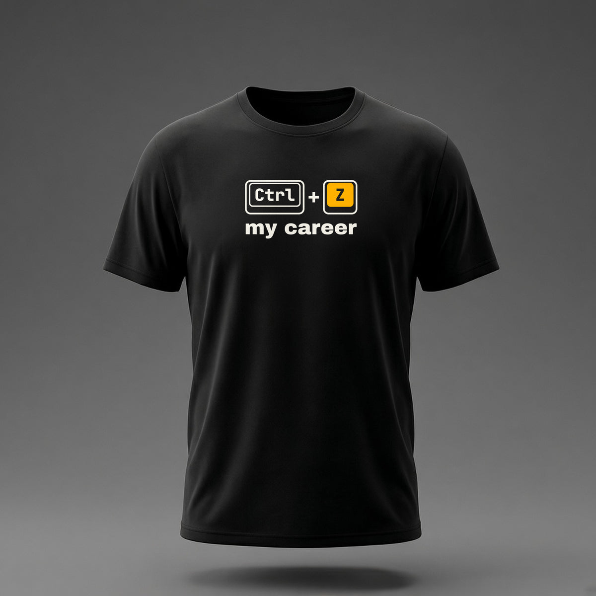 Front view: Black t-shirt floating on a grey background with Ctrl and Z keycaps over the words 'my career' printed across the chest in off-white and amber.