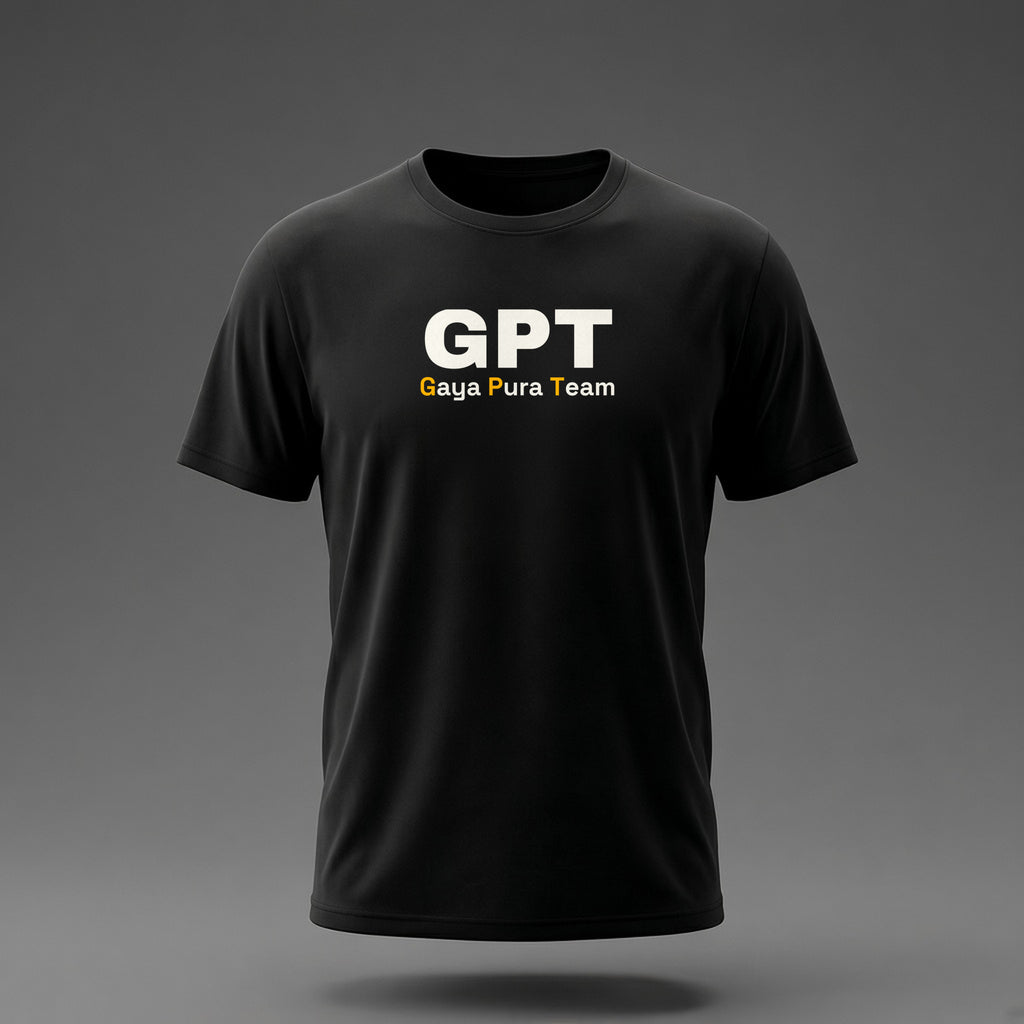 Front view: Black t-shirt floating on a grey background with a large three-letter acronym over the words 'Gaya Pura Team' printed across the chest in off-white and amber.