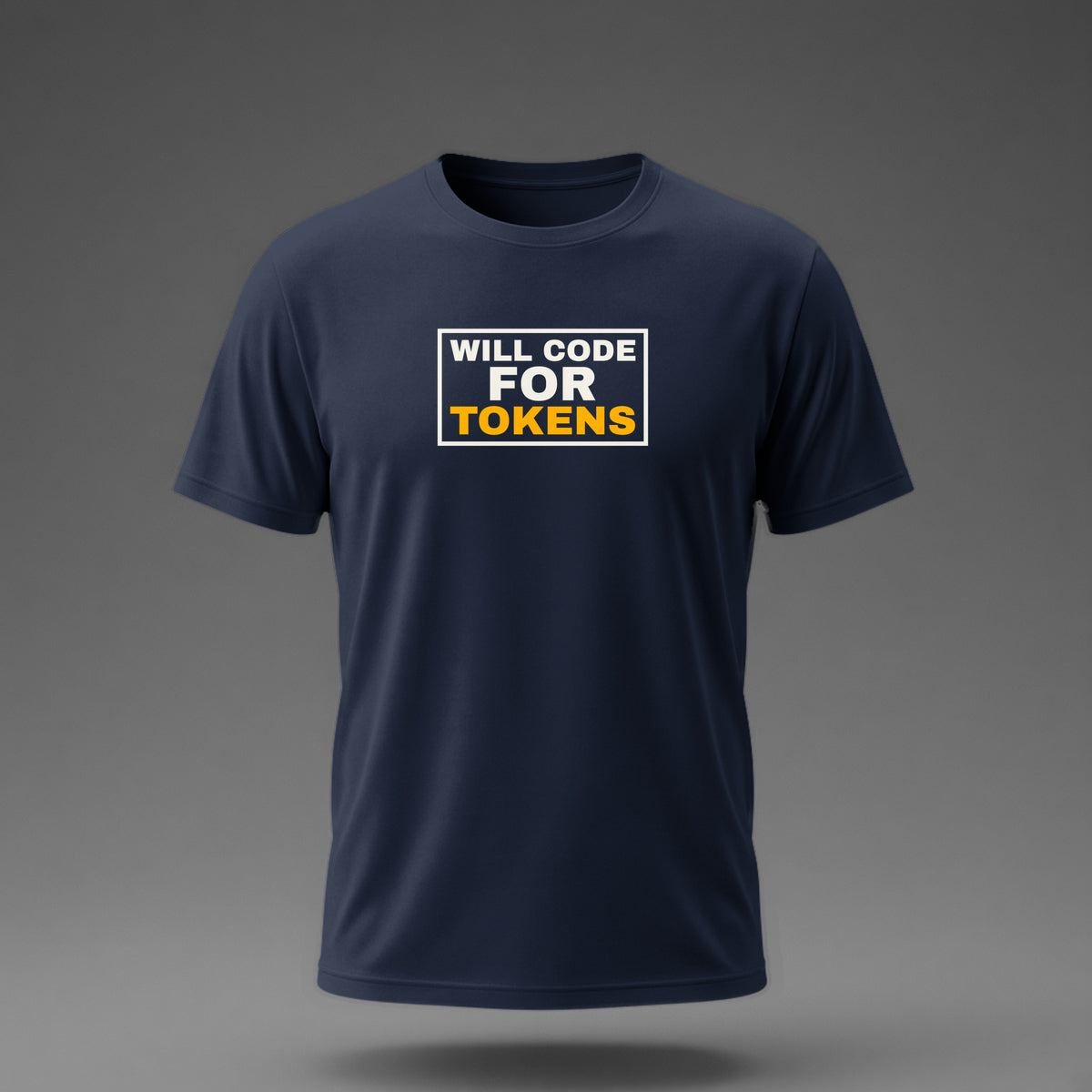 Front view: Navy t-shirt floating on a grey background with 'Will code for tokens' inside a sign outline printed across the chest in off-white and amber.