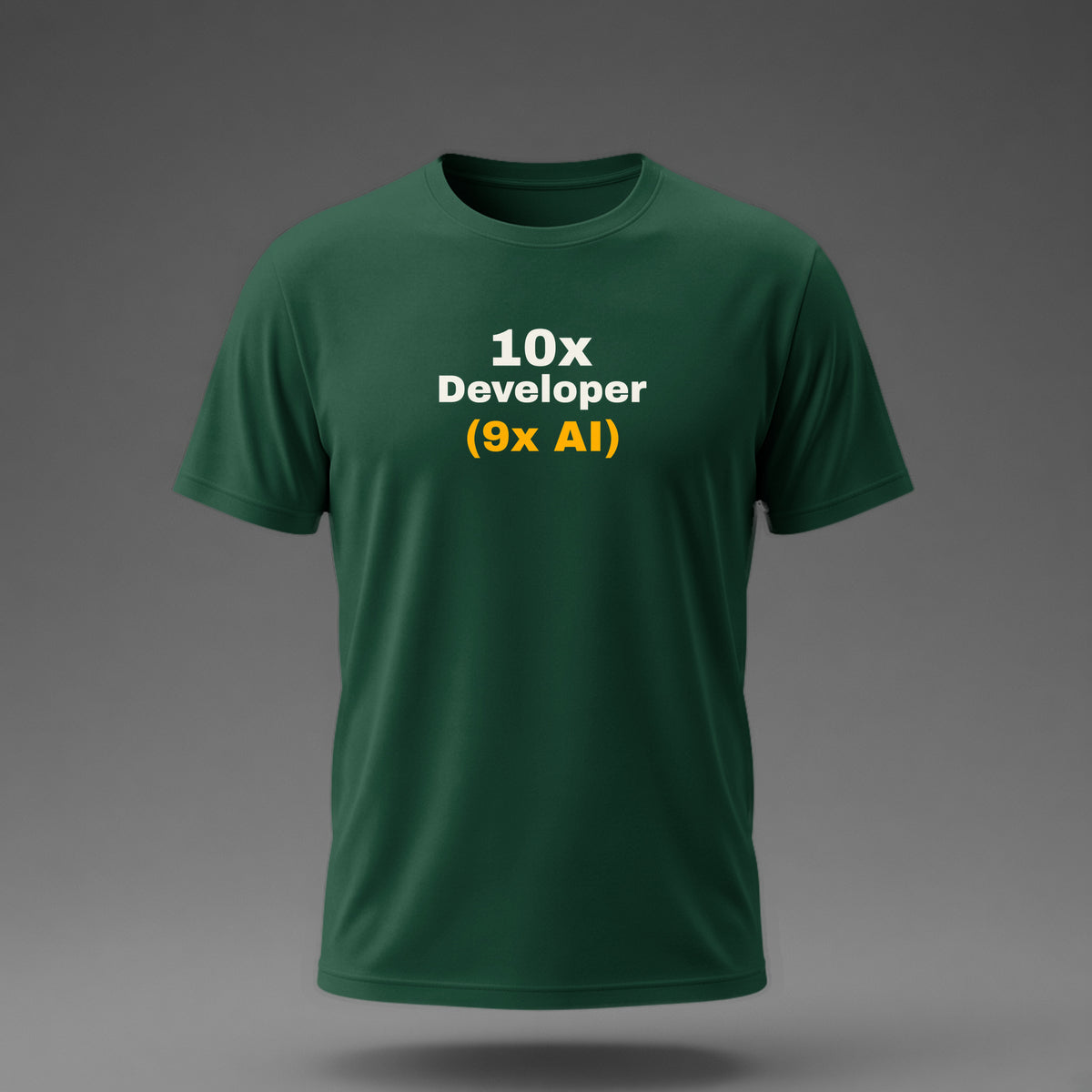 Front view: Bottle Green t-shirt floating on a grey background with '10x Developer (9x AI)' with the footnote in amber printed across the chest in off-white and amber.