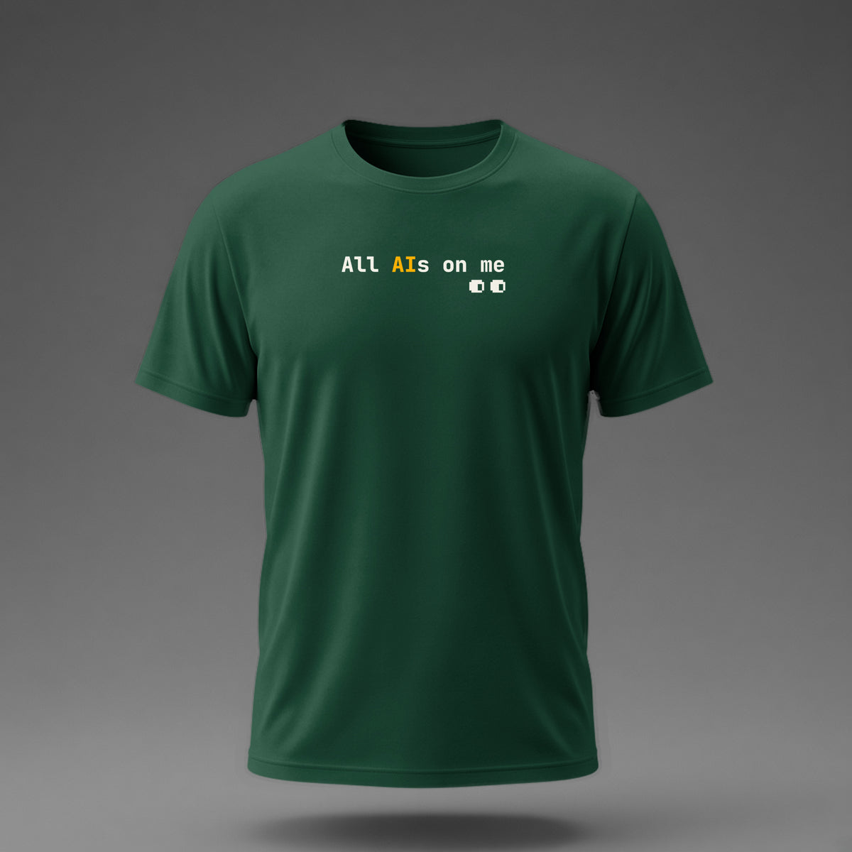 Front view: Bottle Green t-shirt floating on a grey background with 'All AIs on me' on one line with pixel eyes printed across the chest in off-white and amber.