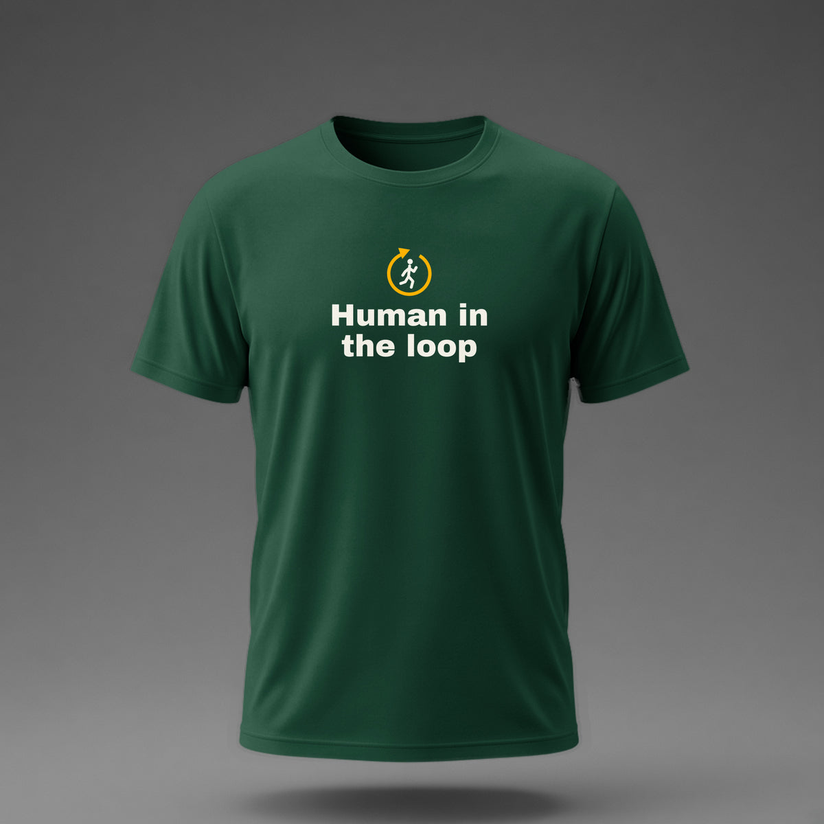 Front view: Bottle Green t-shirt floating on a grey background with 'Human in the loop' under a stick human jogging inside a loop arrow printed across the chest in off-white and amber.