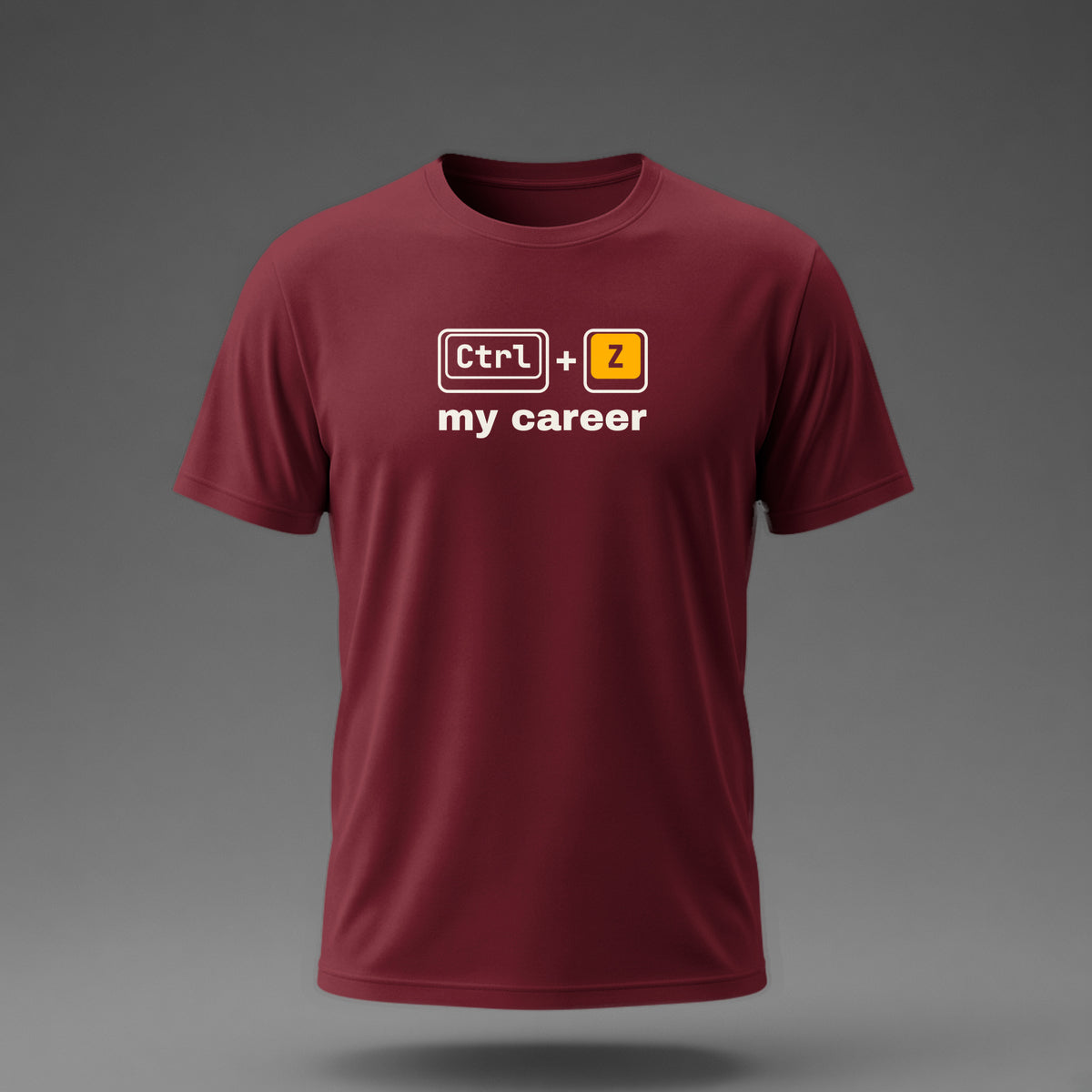 Front view: Maroon t-shirt floating on a grey background with Ctrl and Z keycaps over the words 'my career' printed across the chest in off-white and amber.